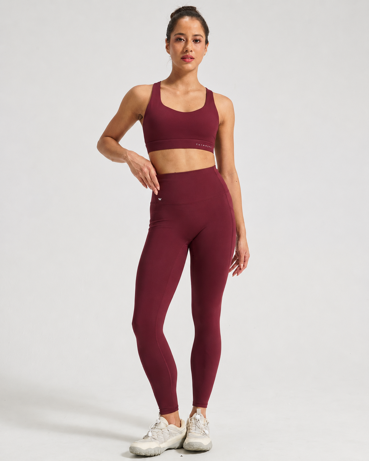 Hybrid Race Bra and Hybrid Pace Tight 7/8 in Burgundy.