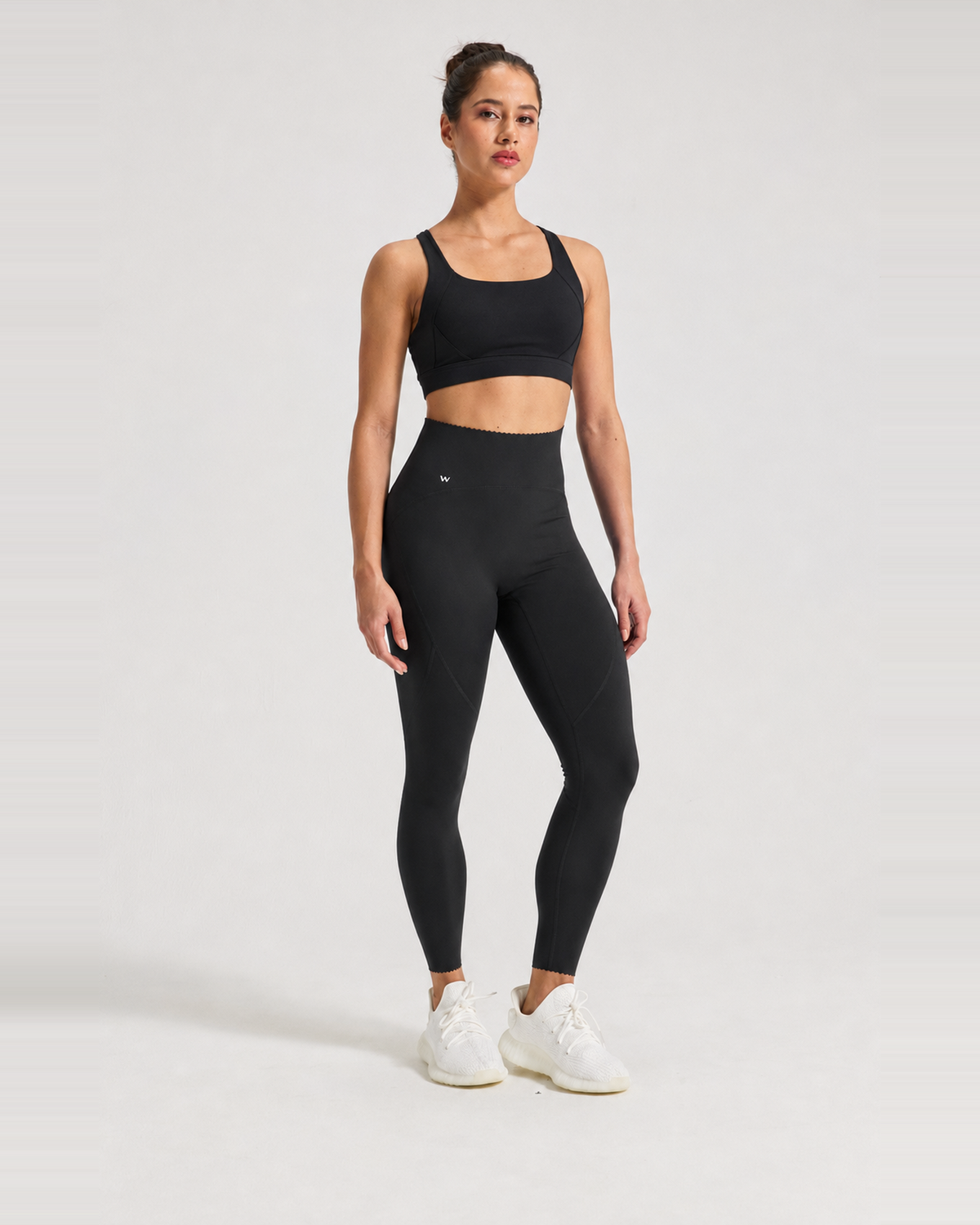 Flow Wynn Bra and Flow Wave Legging 7/8 in Obsidian Black.