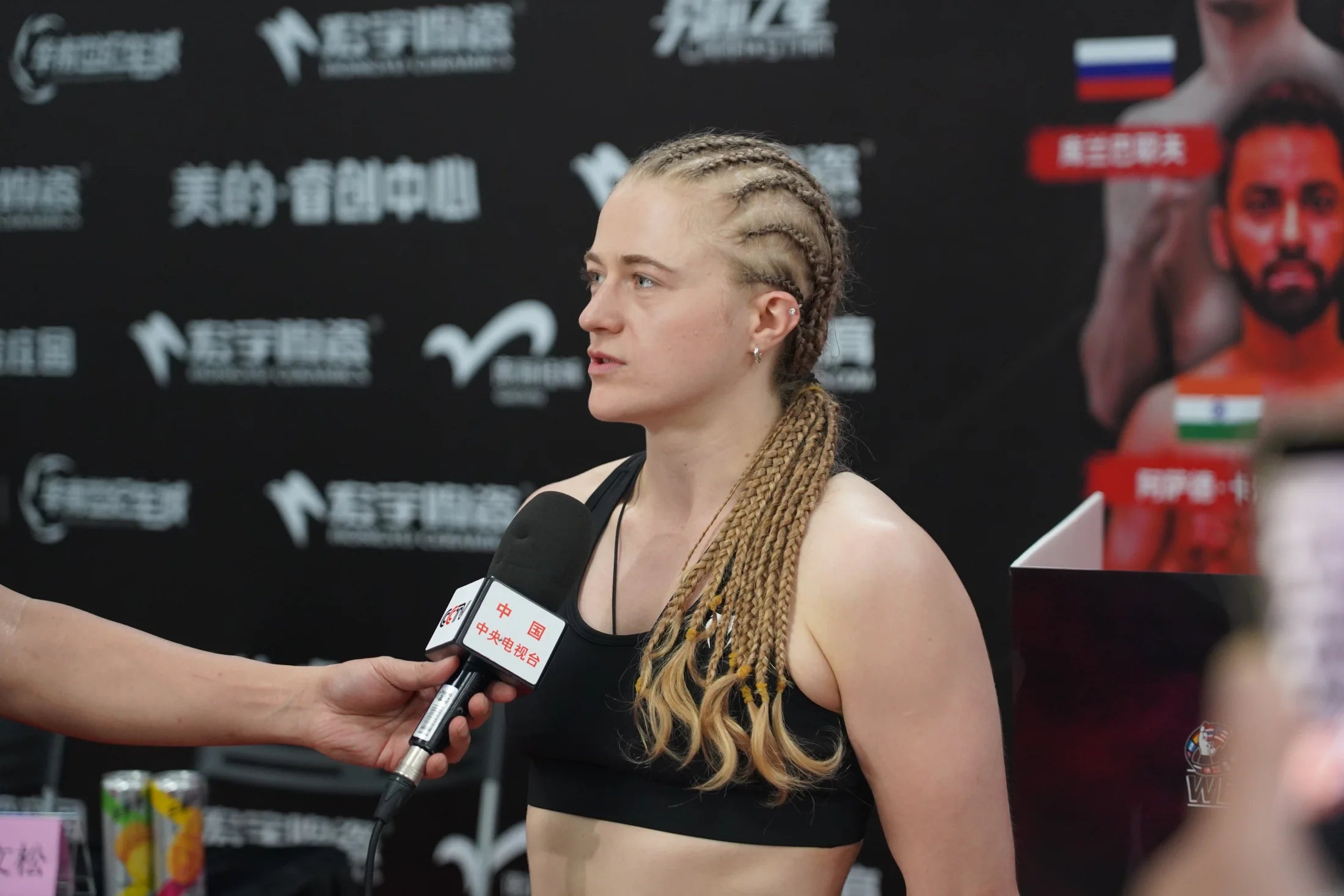 Ellie Bouttell speaking during a post-fight interview