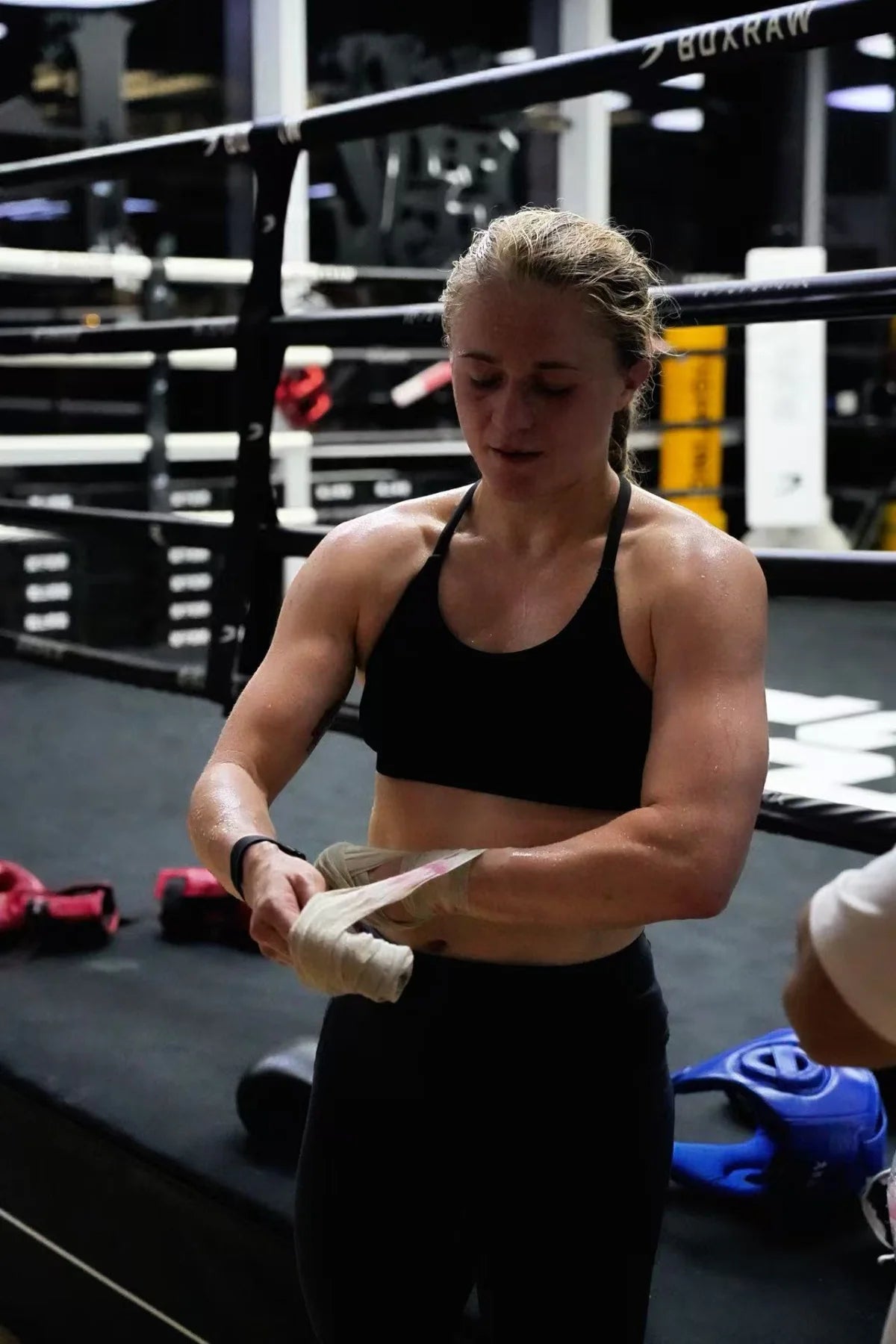 Ellie Bouttell preparing her hands before training